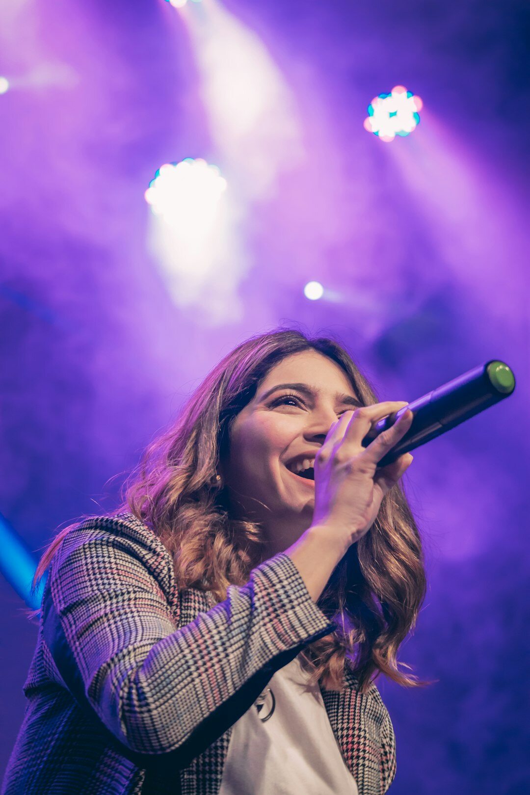 singer performing on stage